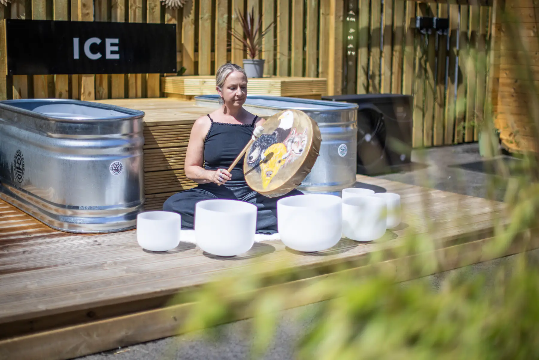 Sound instruments beside the cold plunge tubs at Fuse Saunas